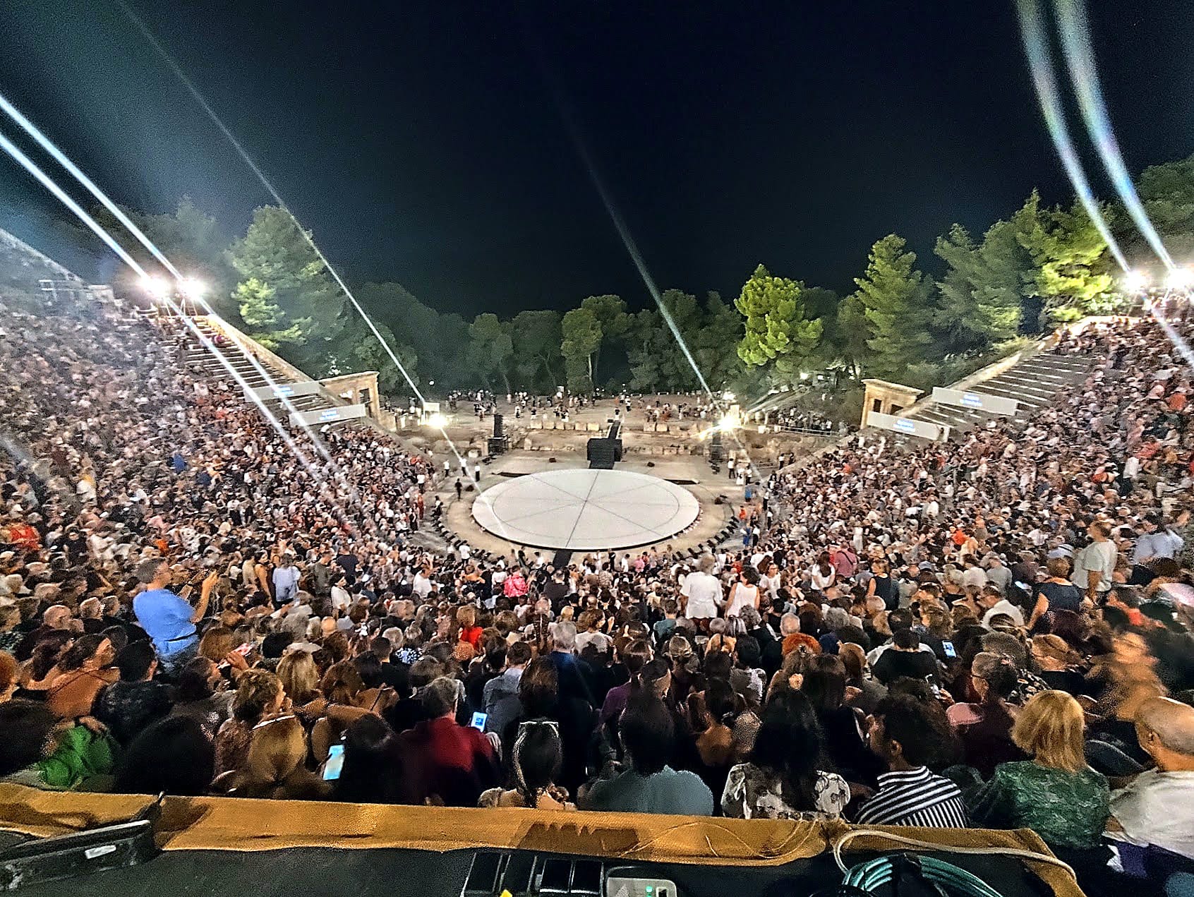 Ancient theatre of Epidaurus filled for a night performance